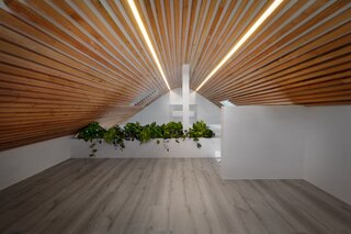 Though the ceiling looks spectacular, it’s really crafted from standard 2’x2’ boards from Home Depot. LED light strips enhance the impact. “When you explain the method to someone, they’re like, ‘that’s it?!’” Laughs Losada-Amor. 
