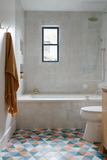 Popham Design supplied the tiles in the bathrooms, were Gebhardt chose to incorporate more color.